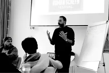 Elyes Baccar teaching an IAM workshop